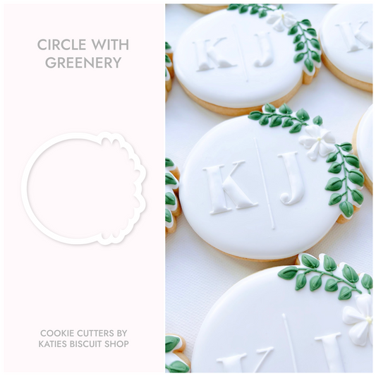 3D printed cookie utter in the shape of a plaque with greenery 