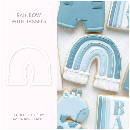 3D printed cookie cutter by katies biscuit shop in the shape of a rainbow with tassels 
