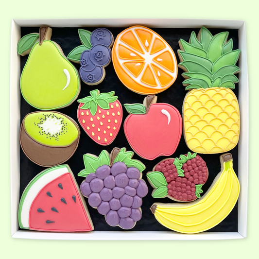 A colourful selection of fruits hand iced biscuits by Katie's biscuit shop 