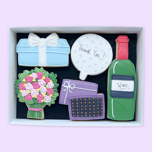 Hand Iced Thank you themed Biscuits in an open white gift box by Katie's Biscuit Shop 